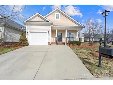 Charming single-Gathering home featuring a one-car garage and cozy front porch at 1005 Jody Dr, Matthews, NC 28104