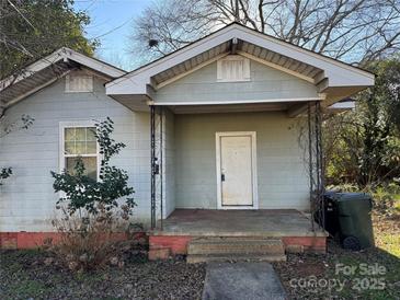 Charming light gray house with a covered porch and small front yard at 325 Laurens St, Rock Hill, SC 29730