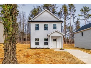 Two-story white house with gray trim and walkway at 205 Benfield Rd, Kings Mountain, NC 28086