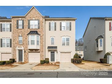 Attractive 2-story townhome with neutral exterior and 2-car garage at 2151 Belle Vernon Ave, Charlotte, NC 28210