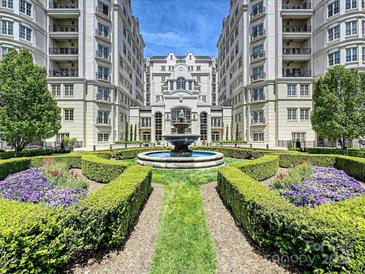 Elegant courtyard with fountain and manicured landscaping at 2823 Providence Rd # 252, Charlotte, NC 28211