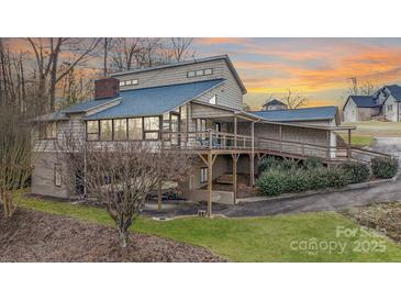 Lakefront home with expansive deck and stunning sunset views at 3910 6Th Nw St, Hickory, NC 28601