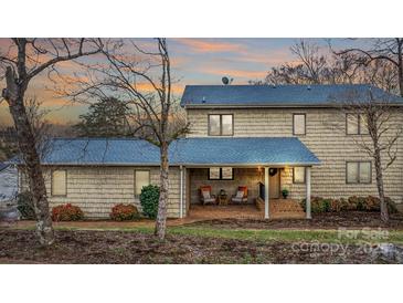 Two-story home with covered porch and brick entryway at 3910 6Th Nw St, Hickory, NC 28601