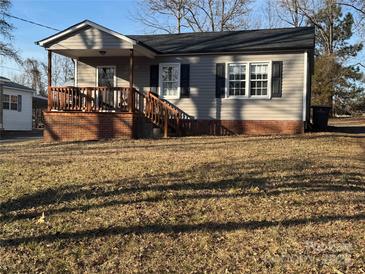 Ranch style home with front porch and large yard at 604 Kimball St, Kannapolis, NC 28081