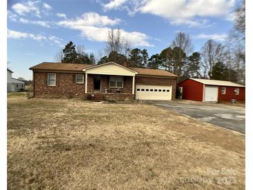 Charming brick home with a one car garage and a large shed at 740 Jackson Rd, Salisbury, NC 28146