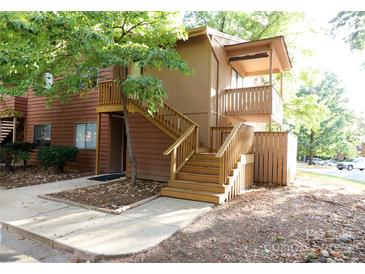 Exterior view of condo with stairs and private entrance at 1419 Riverwood Ct, Rock Hill, SC 29732