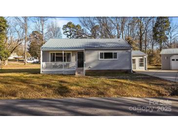 Charming ranch home with front porch and mature landscaping at 120 Moyle Ave, Salisbury, NC 28146