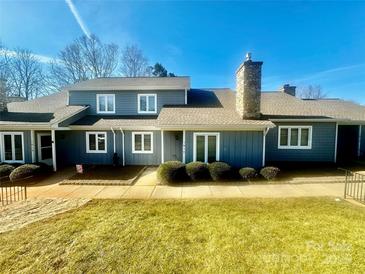 Charming two-story home with a stone chimney, well-maintained lawn, and inviting curb appeal at 1017 21St Ne Ave, Hickory, NC 28601