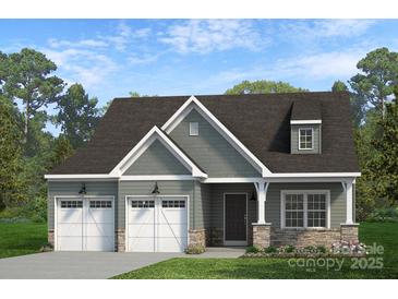 Charming home featuring a two-car garage, stone accents, and classic architectural details at Lot 109 Mayes Meadow Dr # Woodford, Cornelius, NC 28078