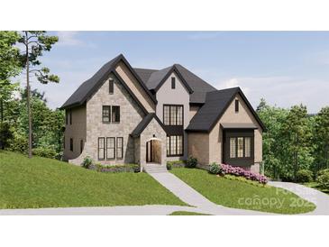 Two-story house with stone and brick accents, a large front yard, and a walkway leading to the entrance at 1312A Reflection Pointe Blvd # 331, Belmont, NC 28012