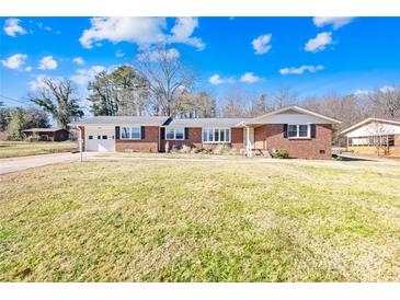 Brick ranch house with attached garage and spacious lawn at 2431 17Th Ne St # 9-13, Hickory, NC 28601