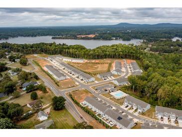 Aerial view of townhouses with lake access and community pool at 4134 Steel Way, Sherrills Ford, NC 28673