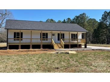 Charming single-story home with a welcoming front porch and black shutters at 4262 Williamson Rd, Rock Hill, SC 29730