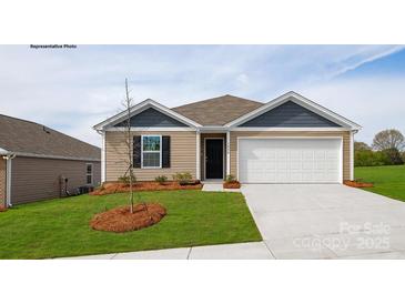 Charming single Gathering home featuring a two car garage and a well manicured lawn at 1766 Falls Cove Rd, Newton, NC 28658