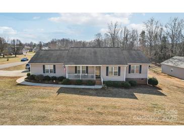 Ranch style house with a spacious yard and mature trees at 2720 Hill Top Dr, Salisbury, NC 28147