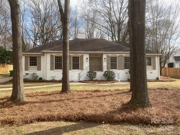 Charming single-story home with classic shutters, inviting front entrance and well-maintained lawn at 2100 Knickerbocker Dr, Charlotte, NC 28212