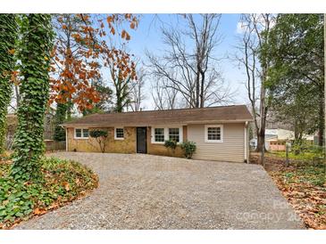 Brick ranch home with gravel driveway, offering curb appeal at 2209 Donnabrook Ln, Gastonia, NC 28052