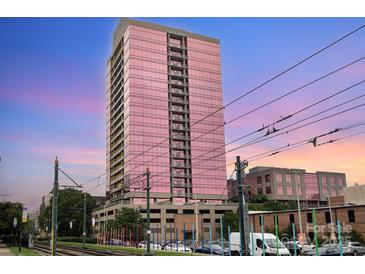 Striking high-rise building with a modern glass facade and multiple balconies offering city views at 315 Arlington Ave # 604, Charlotte, NC 28203