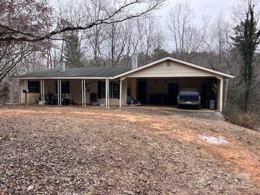 Ranch house with carport and mature trees at 6862 Royal Heights Cir, Hickory, NC 28602