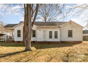 Ranch house with mature trees and a spacious yard at 1979 Charlotte Hwy, Mooresville, NC 28115