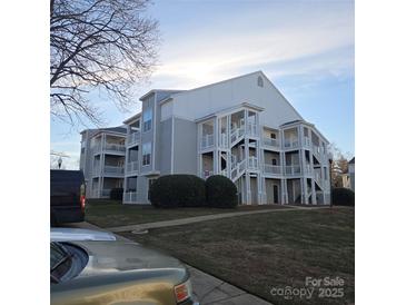 Gray two-story apartment building with white accents and balconies at 14 Hamiltons Bay Ct # 528, Lake Wylie, SC 29710