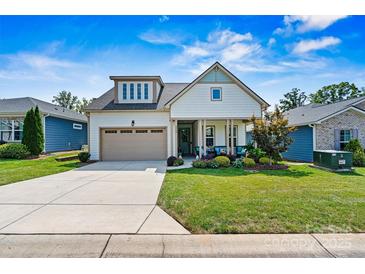Craftsman style home with front porch and landscaped yard at 4998 Looking Glass Trl, Denver, NC 28037