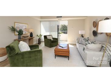 Bright living room with comfy seating and stylish decor at 1300 Reece Rd # G-18, Charlotte, NC 28209