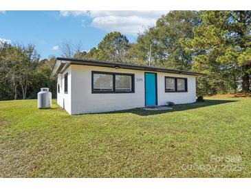 Small white house with teal door and propane tank at 2091 & 2095 Catawba River Rd, Fort Lawn, SC 29714