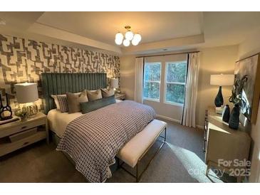 Spacious bedroom with large windows and stylish decor at 272 Laura Elizabeth Ln, Clover, SC 29710