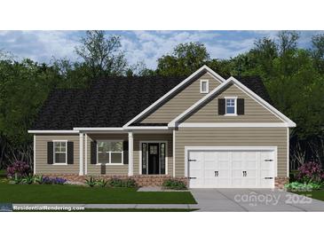 Charming single-story home featuring neutral siding, black shutters, and a two-car garage at 3089 Meadowcrest Dr # 28, Clover, SC 29710
