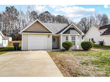 One-story house with attached garage and a small front yard at 5113 Park Place Dr, Dallas, NC 28034