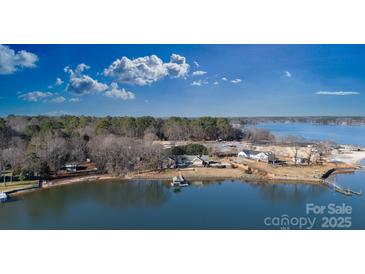 Aerial view of waterfront property with expansive lake views and private dock at 3474 Lake Wylie Dr, Rock Hill, SC 29732