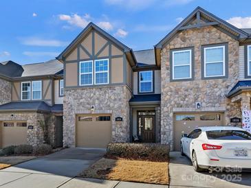 Stone and shingle exterior of charming townhome with 2-car garage at 1018 Archibald Ave, Fort Mill, SC 29708