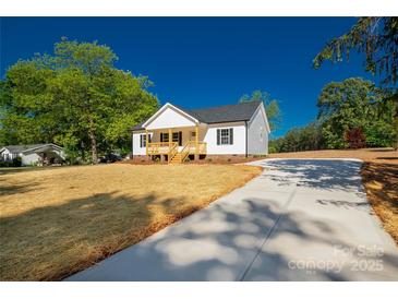 Charming single-story home featuring a welcoming front porch and a freshly laid lawn at 1345 Mack Dr, McConnells, SC 29726