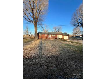 Brick ranch home with large yard at 29086 Sweet Home Church Rd, Albemarle, NC 28001