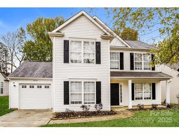 Two-story house with white siding, black shutters, and a two-car garage at 1655 Baylor Dr, Rock Hill, SC 29732