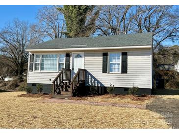 Updated bungalow with new siding, steps and landscaping at 624 Windy Hill Dr, Gastonia, NC 28052