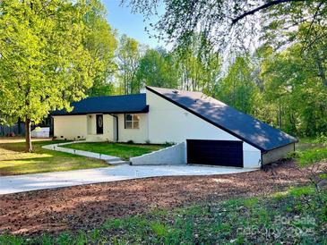 Charming single-story home with white paint and black trim at 108 Vance Allen Ave, Rockwell, NC 28138