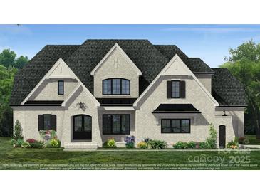 Two-story house with gray stone and black shutters at 01 Mcfalls Dr, Indian Land, SC 29707