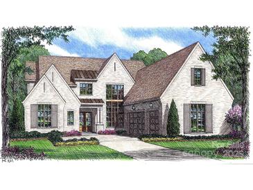 An elegant house with a brick exterior and neutral accent shutters featuring double garage, and well-manicured lawn at 722 Hillside Ave, Charlotte, NC 28209
