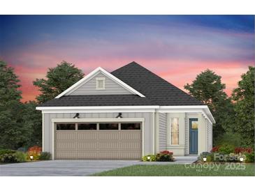 Craftsman style home with a two-car garage and landscaping at 1616 Shoals Ave # 152, Belmont, NC 28012