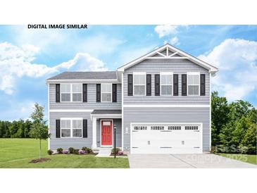 Charming two-story home featuring gray siding, black shutters, a bright red door, and a two-car garage at 282 Basildon St # 1039, Lancaster, SC 29720