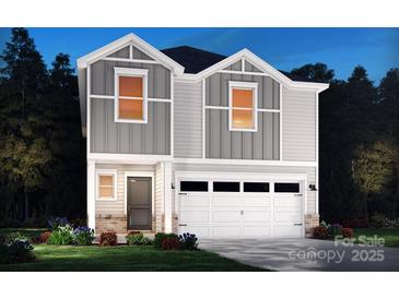Charming new construction home boasts a two-car garage, manicured lawn and craftsman-style details at 833 Blue Canyon Dr, York, SC 29745