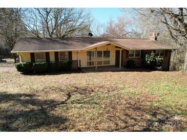 Charming single-story home with brick and vinyl siding and a covered front porch at 4730 16Th Street Ne Dr, Hickory, NC 28602