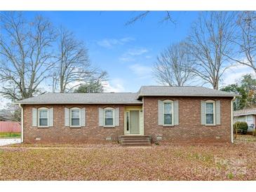 Charming single-story brick home with a well-maintained lawn and inviting entrance at 1780 Lumpkin Cir, Rock Hill, SC 29732