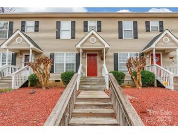 Inviting townhouse with red front door and covered porch at 1465 Flintwood Dr, Rock Hill, SC 29732