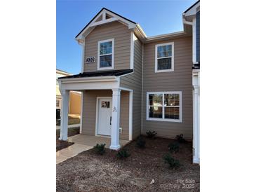 Charming two-story home showcasing a welcoming porch and modern architectural details at 330 Malvern Sw Ave # A, Concord, NC 28025