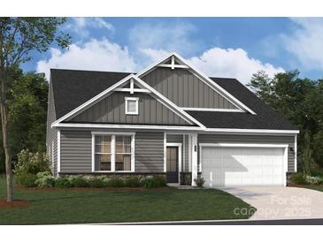 New construction home features a gray color palette and a two-car garage at 2022 Mantle Ridge Dr, Indian Trail, NC 28079