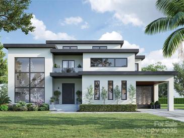 Stunning modern home boasts a clean design, sleek lines, large windows, and a well-manicured lawn at 434 Lansdowne Rd, Charlotte, NC 28270