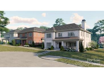 New luxury homes boast beautiful brickwork, covered porches, and professionally landscaped yards at 4008 Nettie Ct # 3, Charlotte, NC 28211